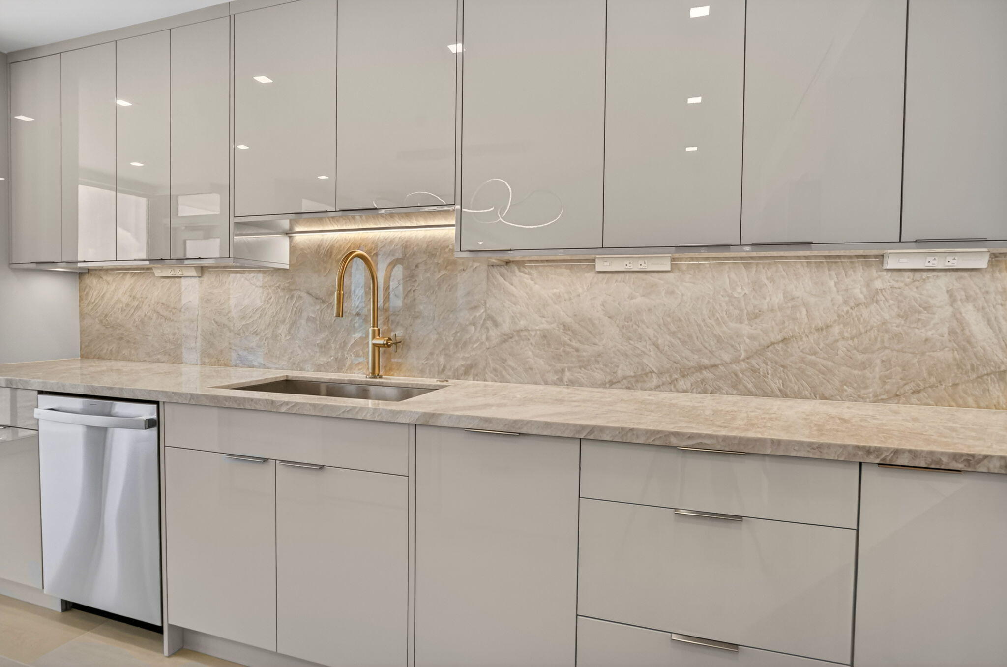 2800 South Ocean Boulevard, Unit 23C Boca Raton, FL 33432 - Photo 13 of 50 a kitchen with granite countertop white cabinets and a sink