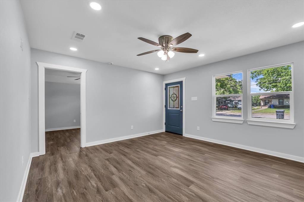 3608 North 26th Street Waco, TX 76708 - Photo 5 of 28 a view of empty room with wooden floor and fan