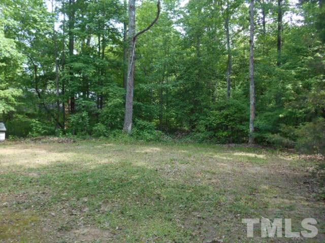 10821 Fanny Brown Road Raleigh, NC 27603 - Photo 3 of 9 a view of a yard with a tree