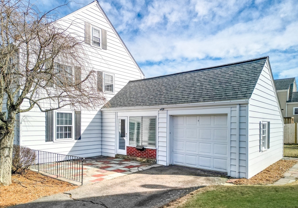 45 Bancroft Road Melrose, MA 02176 - Photo 32 of 37 a front view of a house with a yard