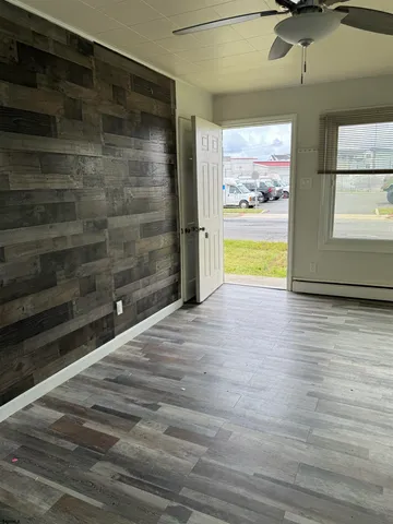 a view of a street with an ocean view