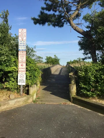 a view of a yard and ocean view