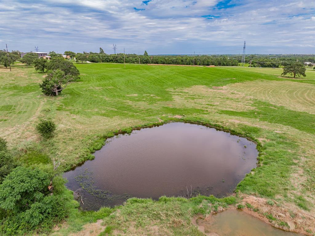 730 North St Decatur Tx 76234 Decatur, TX 76234 - Photo 23 of 24 a view of a lake with a building in the background