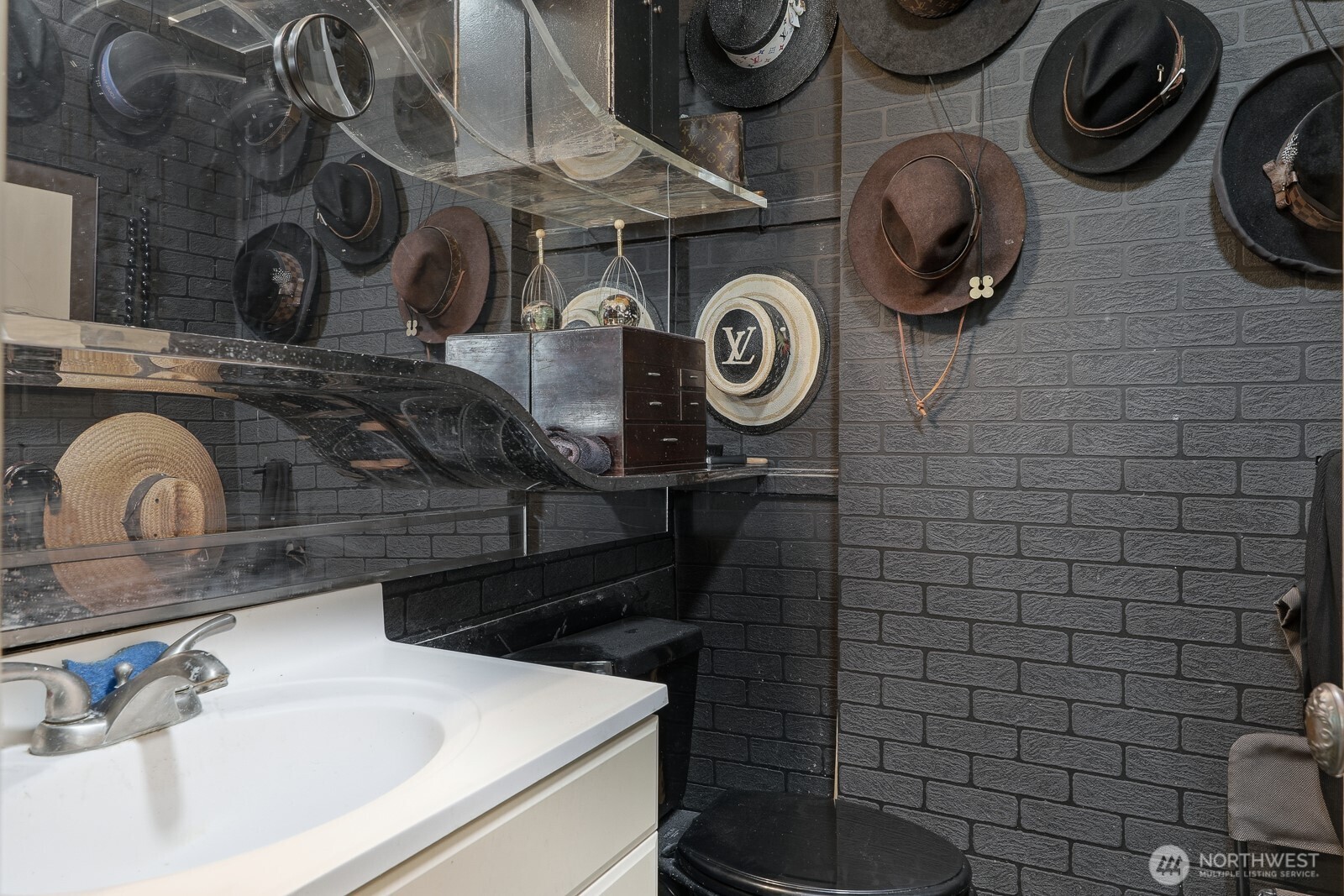 211 14th Avenue East Seattle, WA 98112 - Photo 20 of 32 a bathroom with a sink and a stove