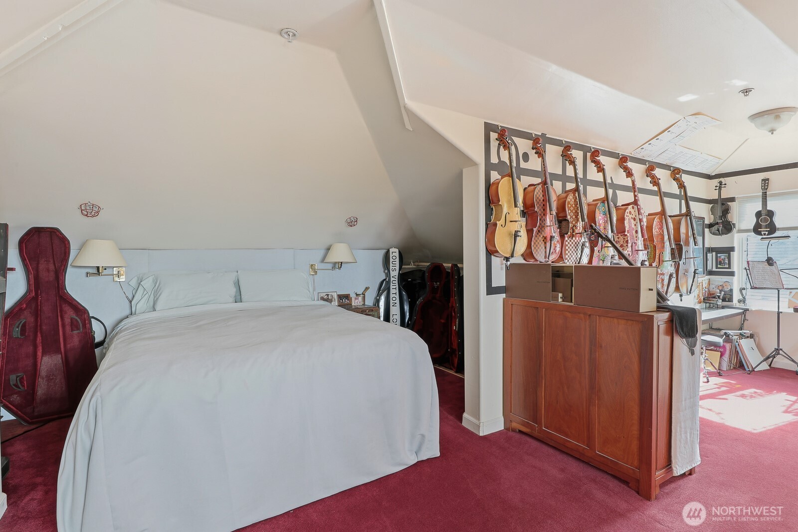 211 14th Avenue East Seattle, WA 98112 - Photo 23 of 32 a bed room with a bed and a large window