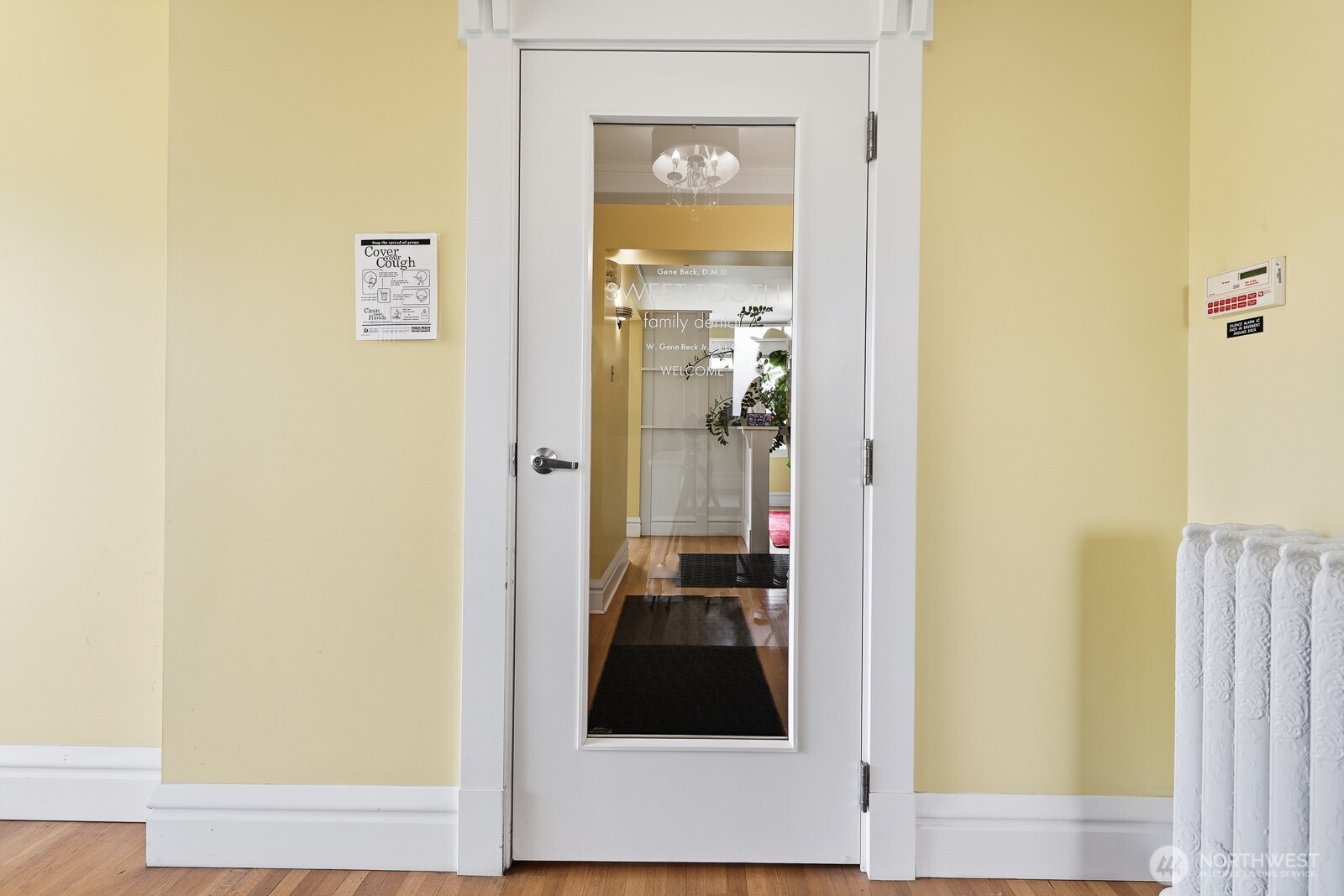 211 14th Avenue East Seattle, WA 98112 - Photo 4 of 32 a view of a bedroom from a hallway