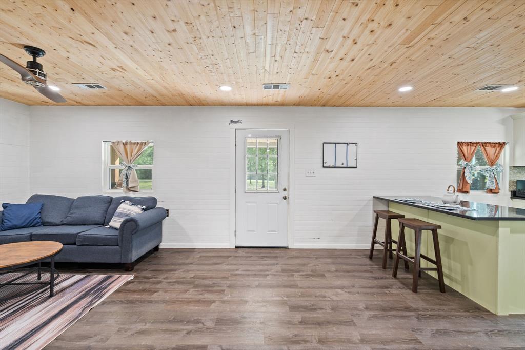 17790 County Road 345 Terrell, TX 75161 - Photo 22 of 37 a living room with furniture and a wooden floor