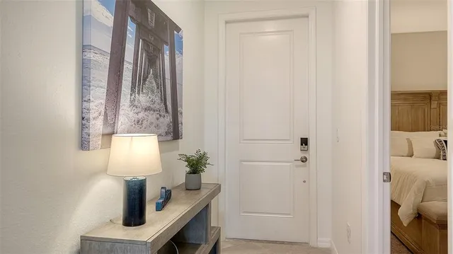 a view of a balcony with chair and window