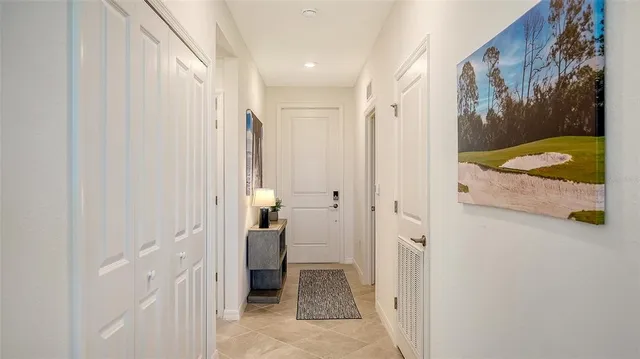 a view of a golf course with a lake