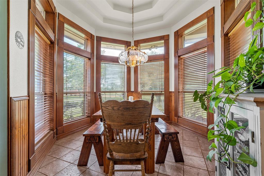 654 County Road 473 Lott, TX 76656 - Photo 12 of 40 a view of a dining room with furniture window and wooden floor