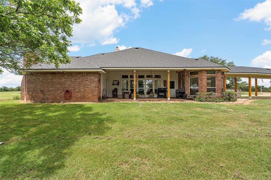 654 County Road 473 Lott, TX 76656 - Photo 20 of 40 front view of a house with a yard