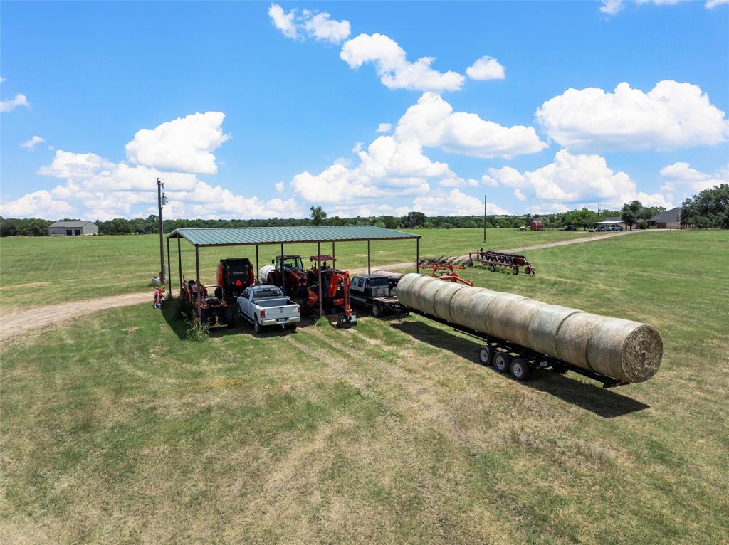 654 County Road 473 Lott, TX 76656 - Photo 24 of 40 a view of a garden with a slide