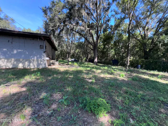 a fire hydrant in the middle of a field