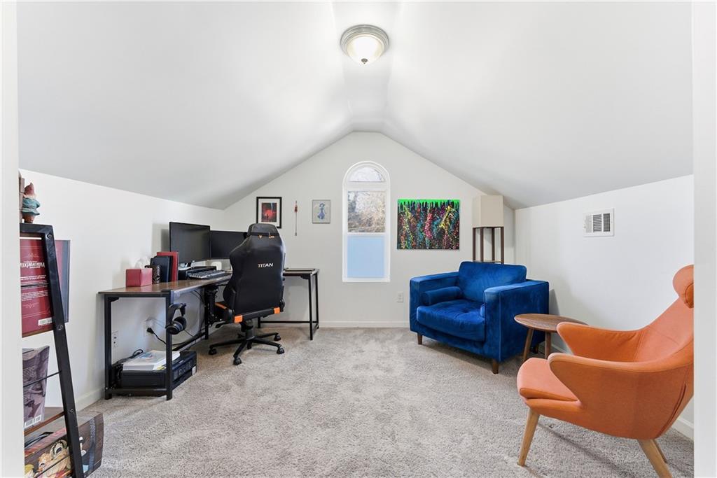 902 Gaston Street Southwest Atlanta, GA 30310 - Photo 33 of 36 a view of a livingroom with workspace and a couch