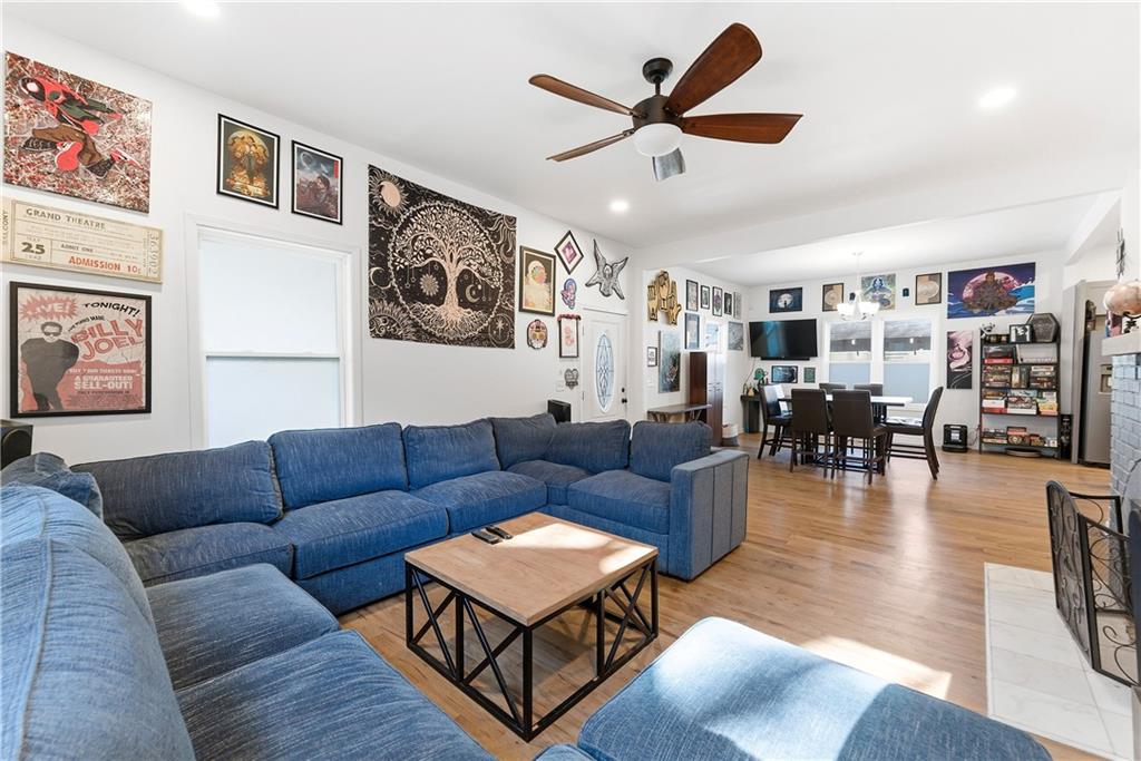 902 Gaston Street Southwest Atlanta, GA 30310 - Photo 6 of 36 a living room with furniture kitchen view and a window