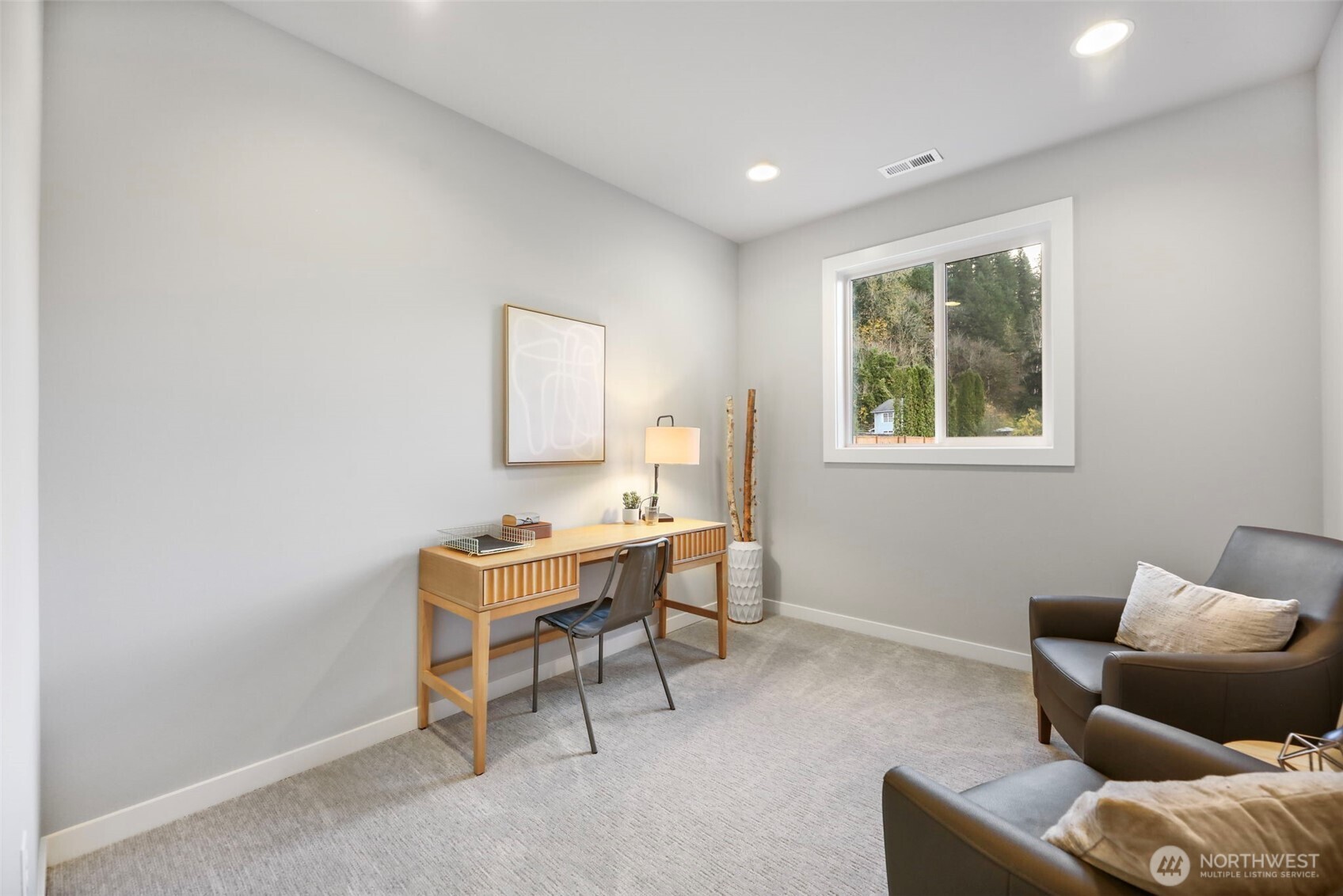 9801 Kelly Road Northeast Carnation, WA 98014 - Photo 21 of 34 a living room with furniture and a window