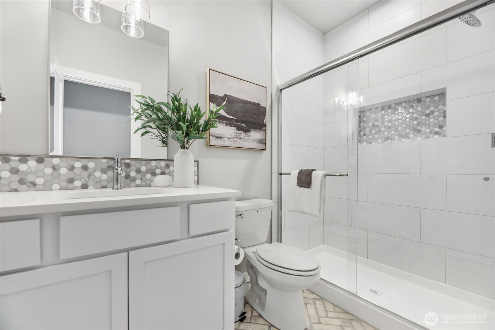 9801 Kelly Road Northeast Carnation, WA 98014 - Photo 22 of 34 a bathroom with a granite countertop sink a toilet and shower