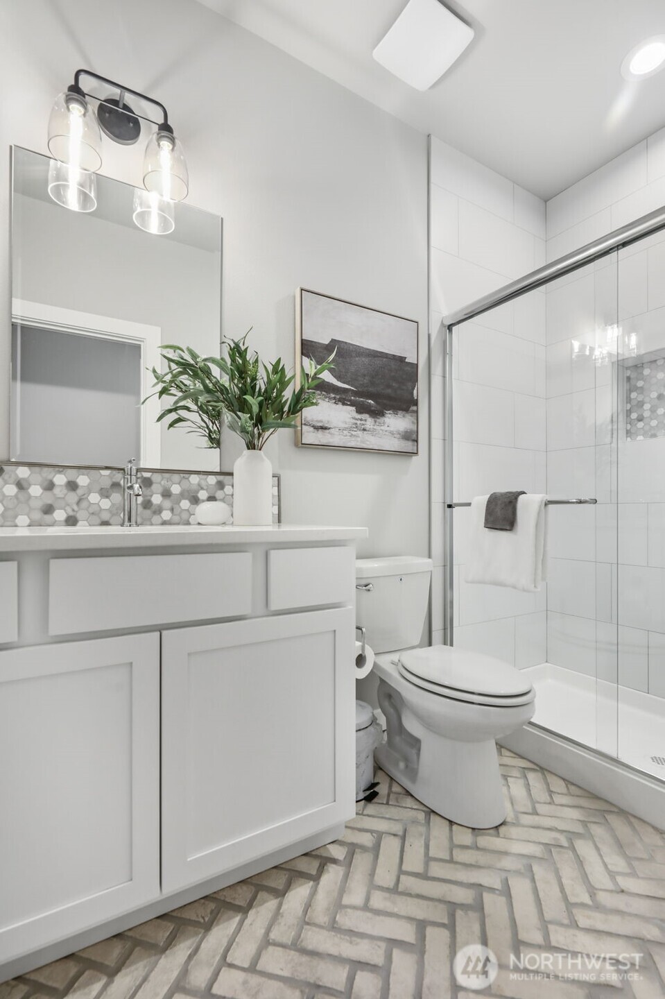 9801 Kelly Road Northeast Carnation, WA 98014 - Photo 23 of 34 a bathroom with a sink a toilet and shower