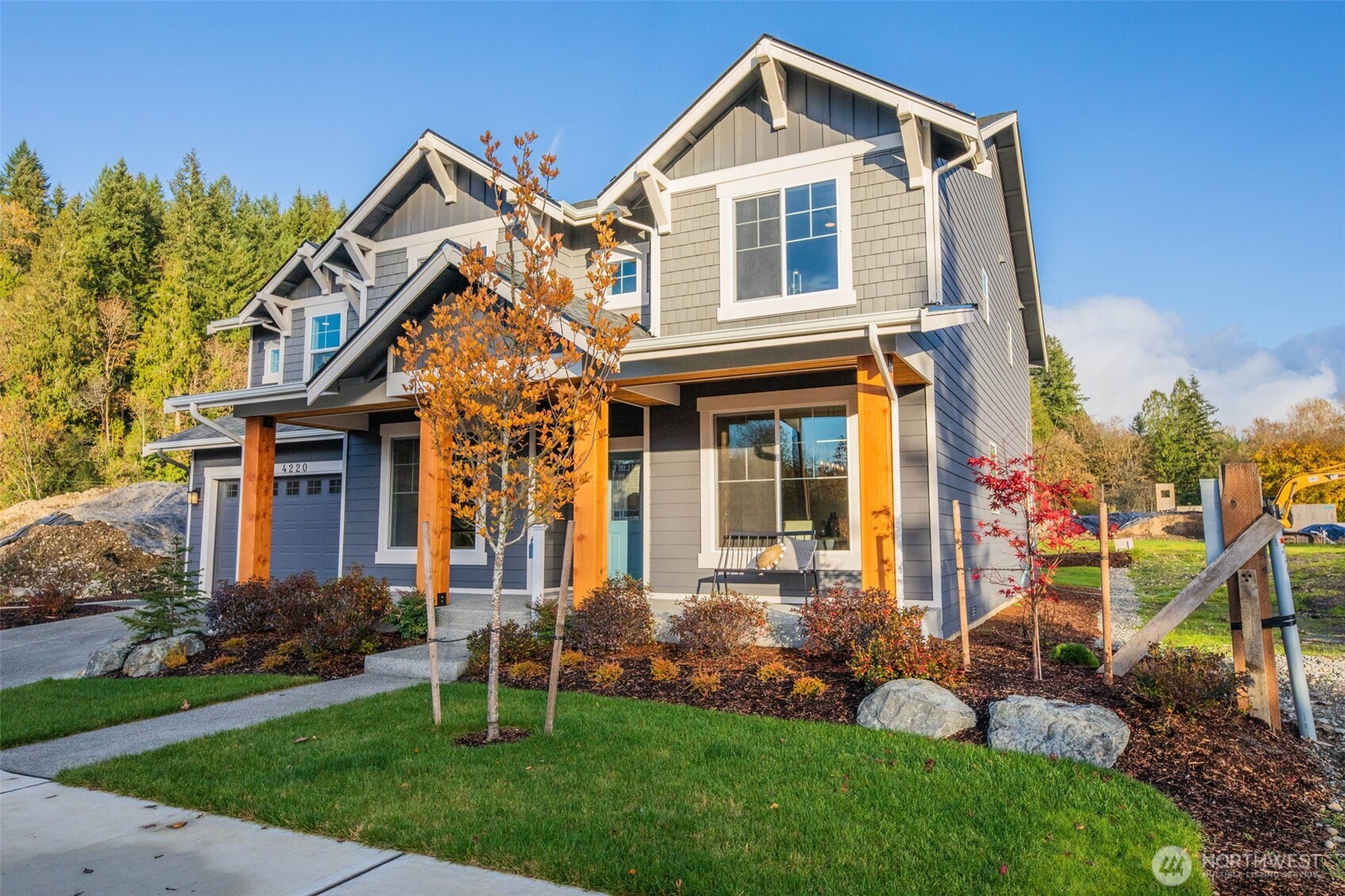 9801 Kelly Road Northeast Carnation, WA 98014 - Photo 34 of 34 a front view of a house with a yard