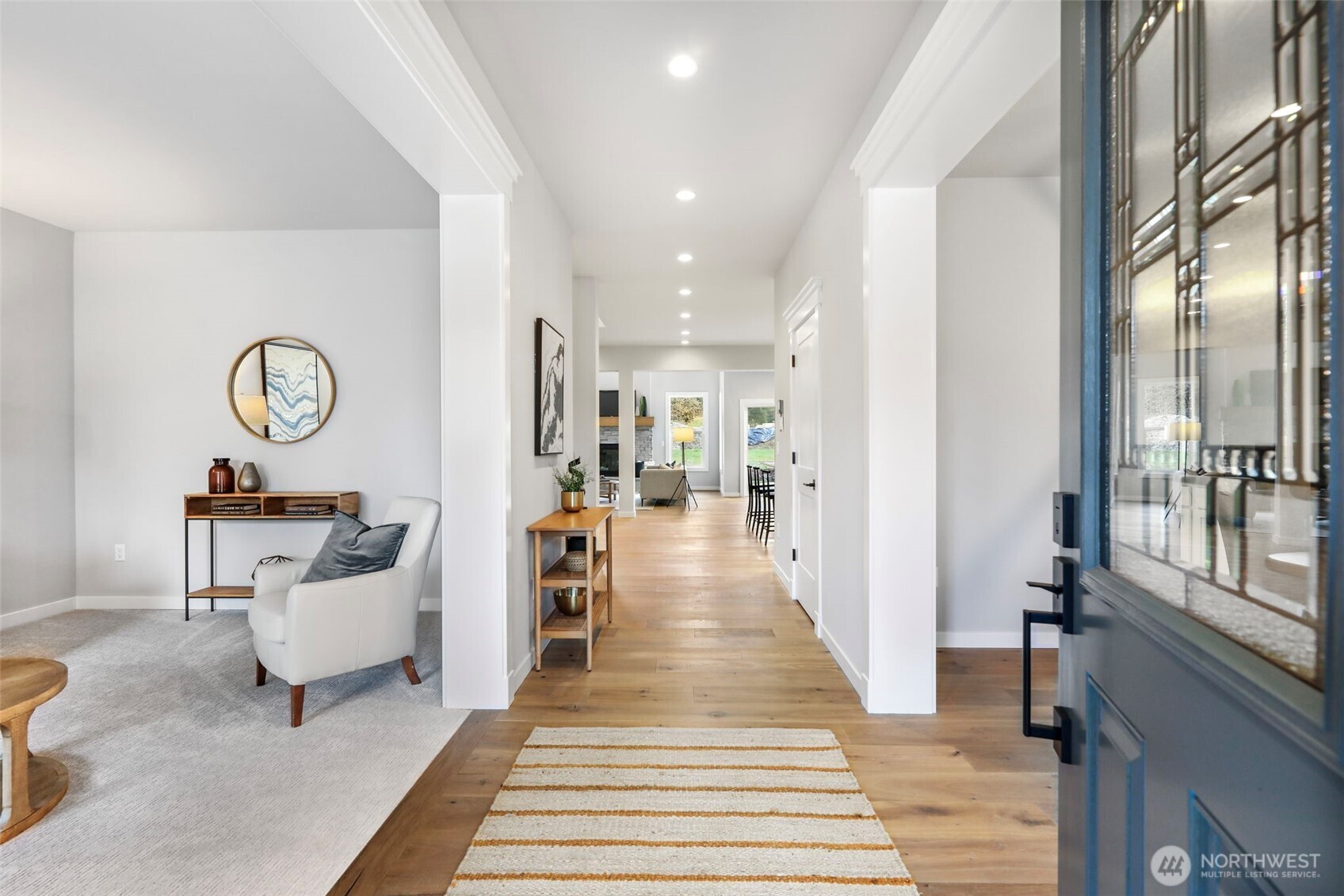 9801 Kelly Road Northeast Carnation, WA 98014 - Photo 5 of 34 a living room with furniture and a table