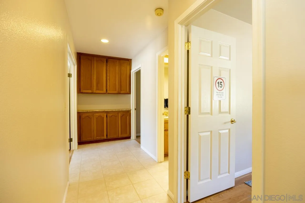 1603 Camino Del Sequan Alpine, CA 91901 - Photo 17 of 48 a view of a hallway with a bathroom