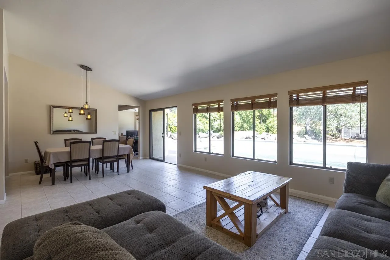 1603 Camino Del Sequan Alpine, CA 91901 - Photo 19 of 48 a living room with furniture and a large window