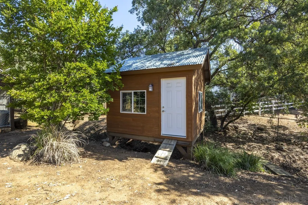 1603 Camino Del Sequan Alpine, CA 91901 - Photo 36 of 48 a front view of a house with a yard