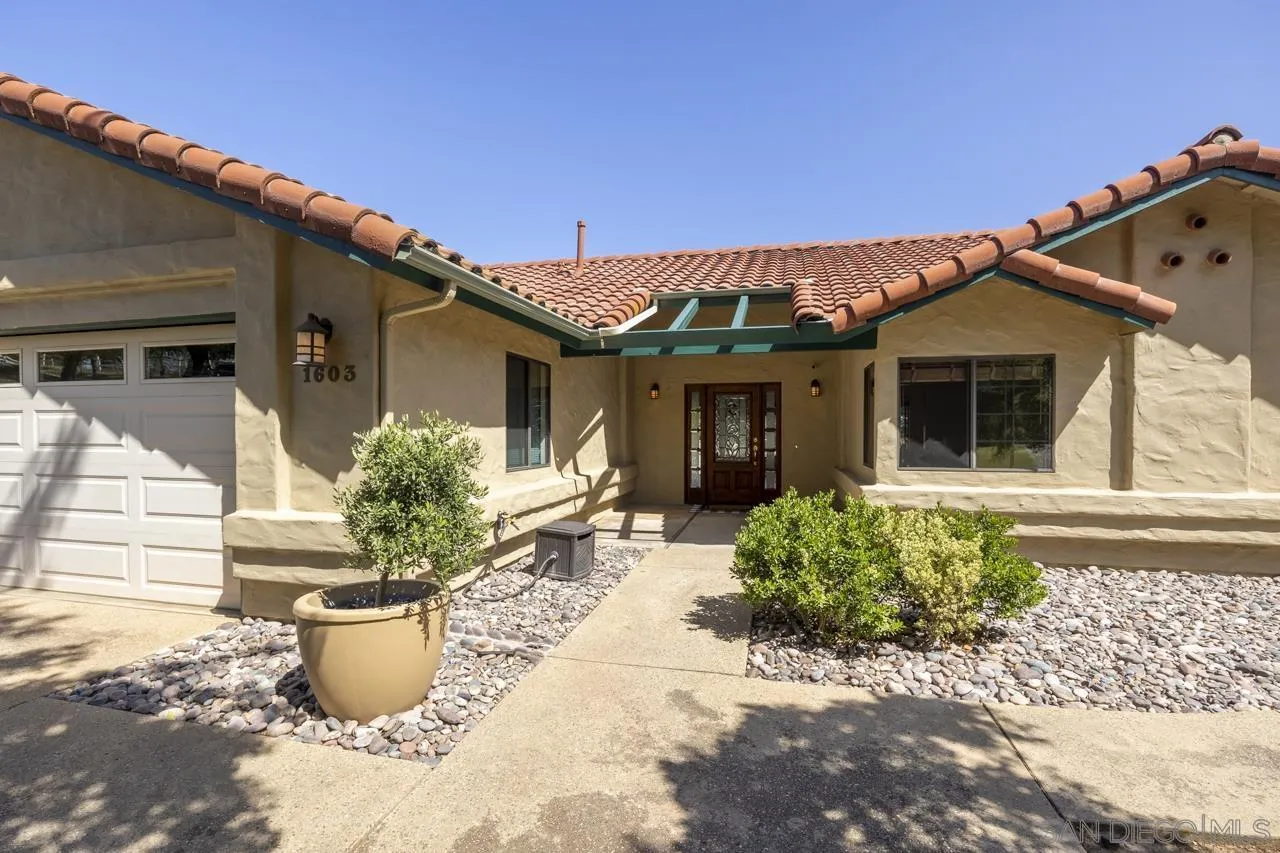 1603 Camino Del Sequan Alpine, CA 91901 - Photo 4 of 48 a front view of a house with potted plants