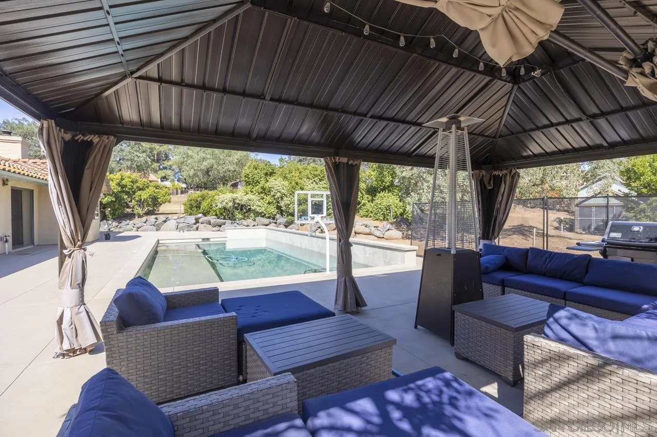 1603 Camino Del Sequan Alpine, CA 91901 - Photo 41 of 48 a living room with furniture and a large window
