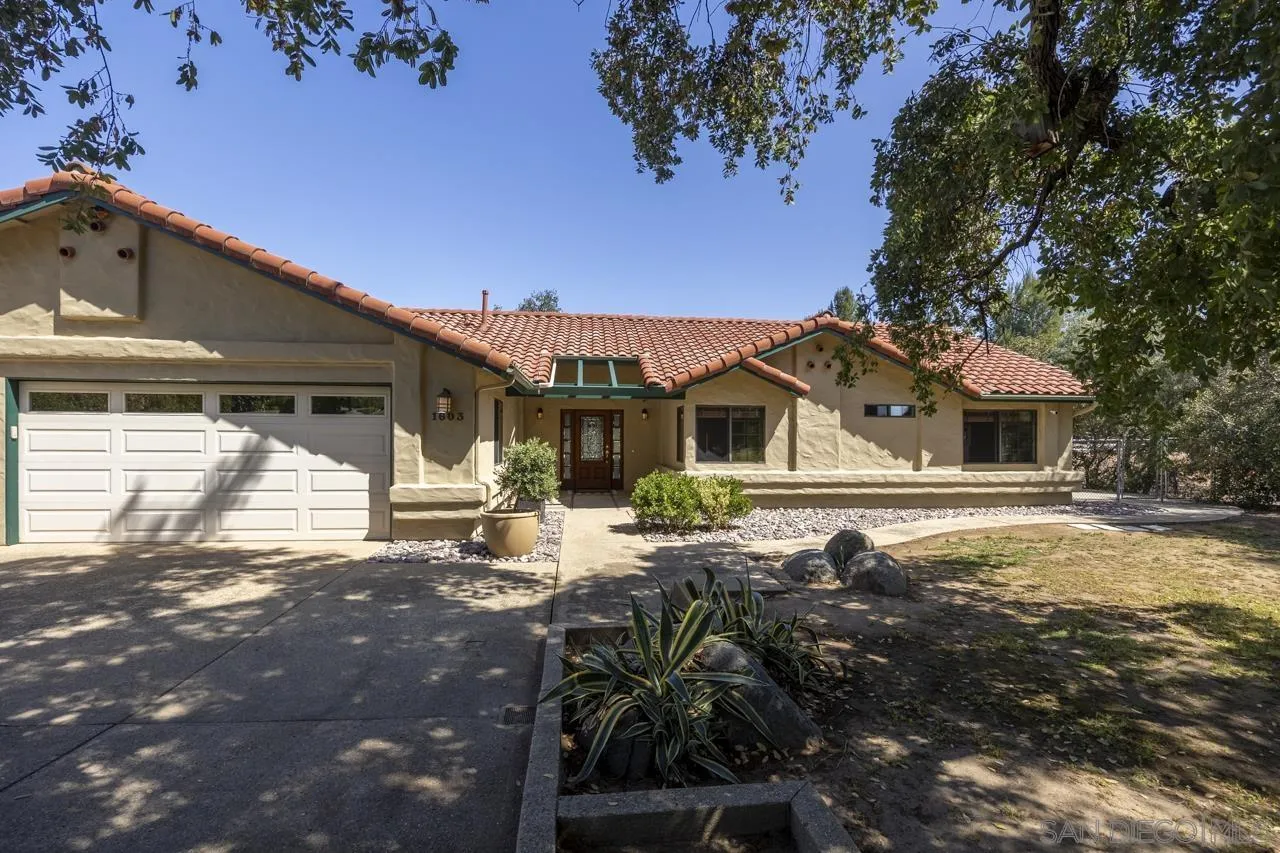 1603 Camino Del Sequan Alpine, CA 91901 - Photo 6 of 48 a front view of a house with garden