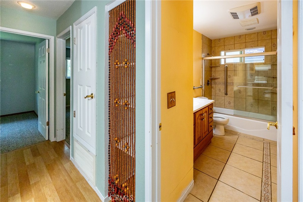 2155 Cowper Street Cambria, CA 93428 - Photo 19 of 35 a bathroom with a shower and a bath tub