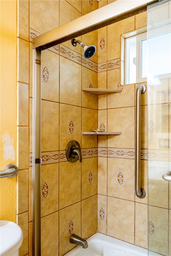 2155 Cowper Street Cambria, CA 93428 - Photo 21 of 35 a bathroom with a shower