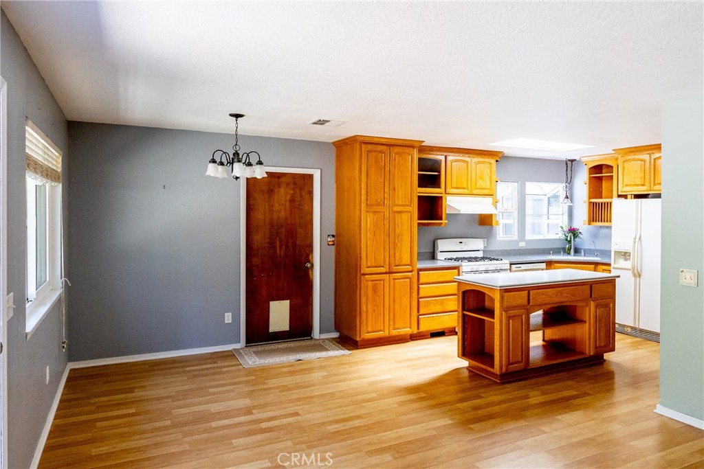 2155 Cowper Street Cambria, CA 93428 - Photo 5 of 35 a view of kitchen with stainless steel appliances granite countertop a stove and a refrigerator