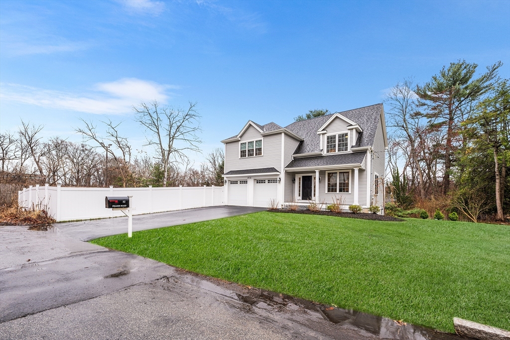 32 Fraser Road Framingham, MA 01702 - Photo 2 of 37 a front view of house with yard and green space
