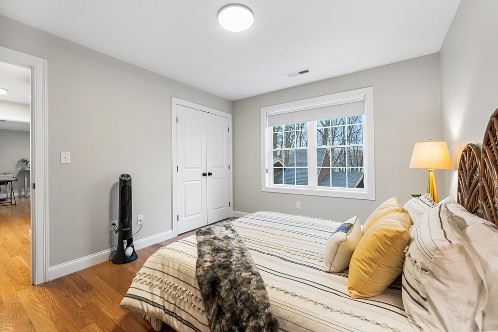 32 Fraser Road Framingham, MA 01702 - Photo 23 of 37 a bedroom with a bed and a large window