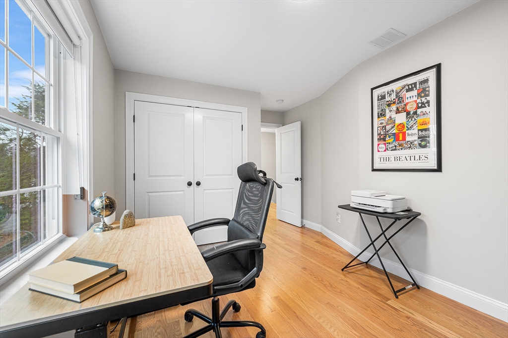 32 Fraser Road Framingham, MA 01702 - Photo 28 of 37 a work room with furniture and wooden floor