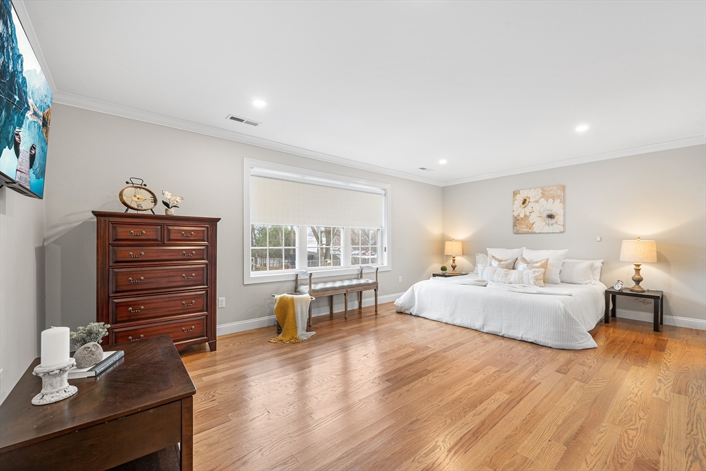 32 Fraser Road Framingham, MA 01702 - Photo 29 of 37 a living room with furniture and wooden floor
