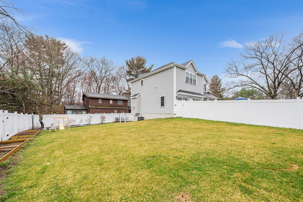32 Fraser Road Framingham, MA 01702 - Photo 6 of 37 a view of a house with a yard