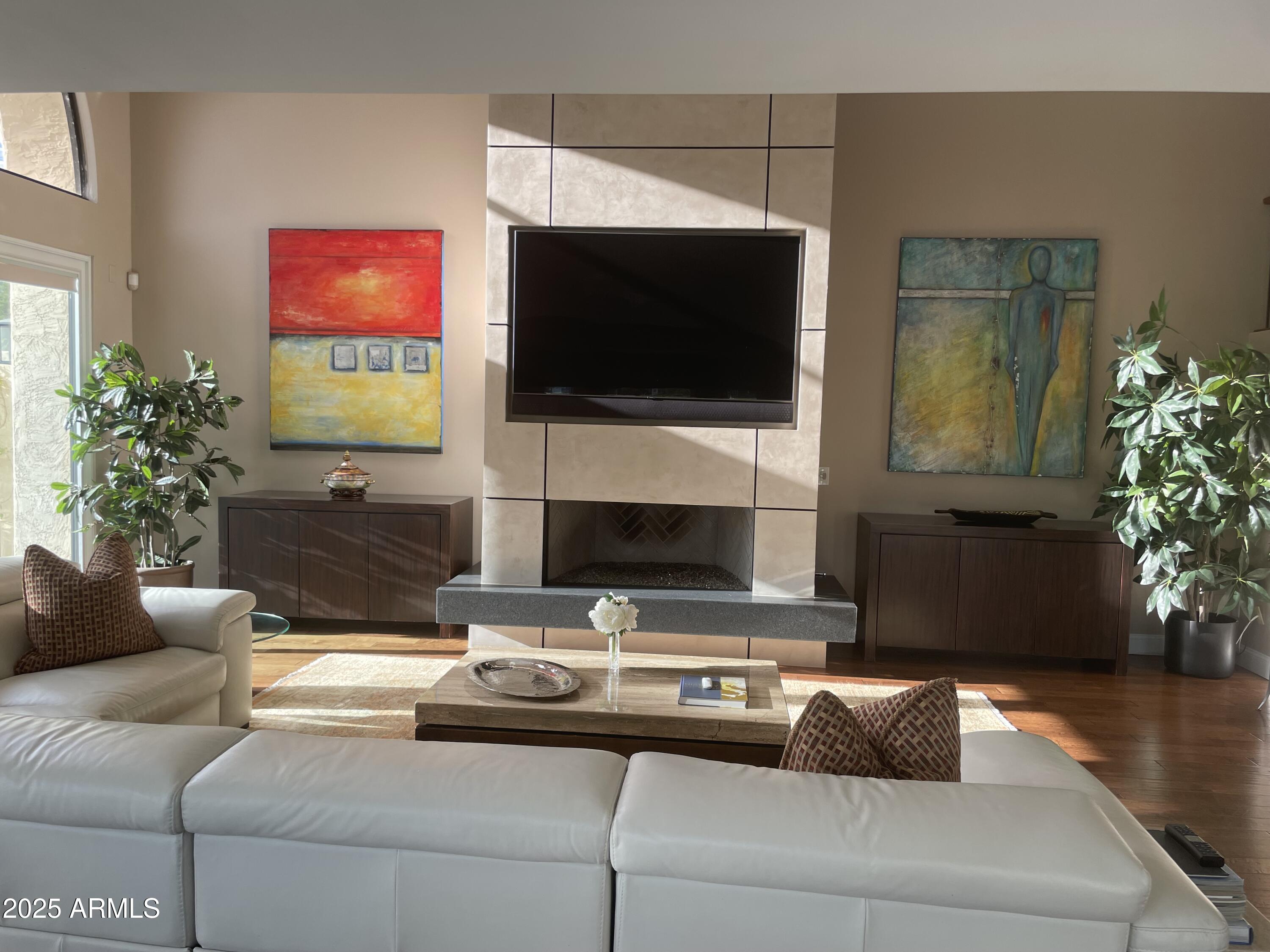 3103 East Georgia Avenue Phoenix, AZ 85016 - Photo 11 of 36 a living room with furniture fireplace and flat screen tv