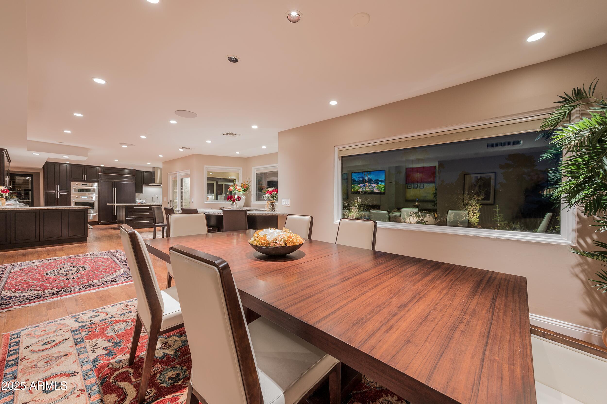 3103 East Georgia Avenue Phoenix, AZ 85016 - Photo 16 of 36 a dining room with furniture and a large window