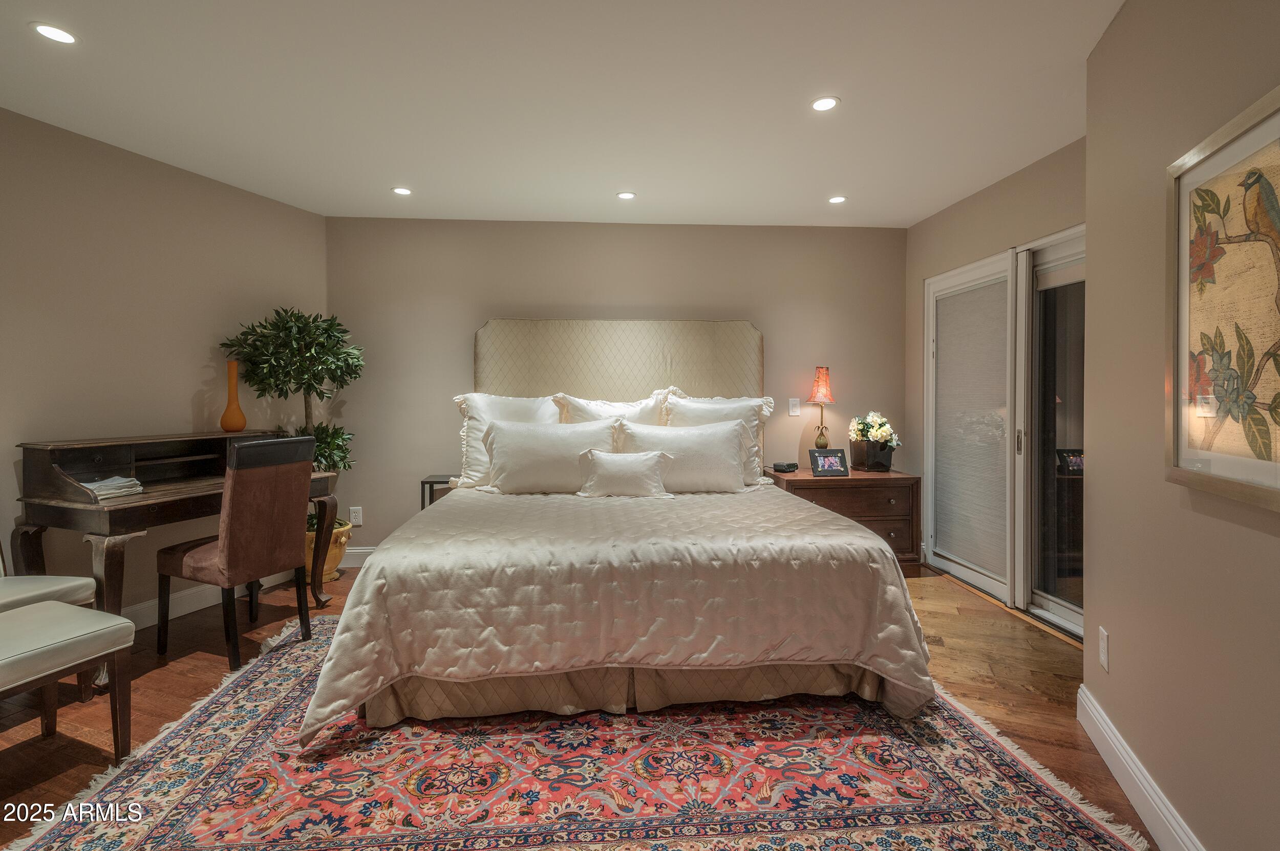 3103 East Georgia Avenue Phoenix, AZ 85016 - Photo 25 of 36 a bedroom with a bed and a potted plant