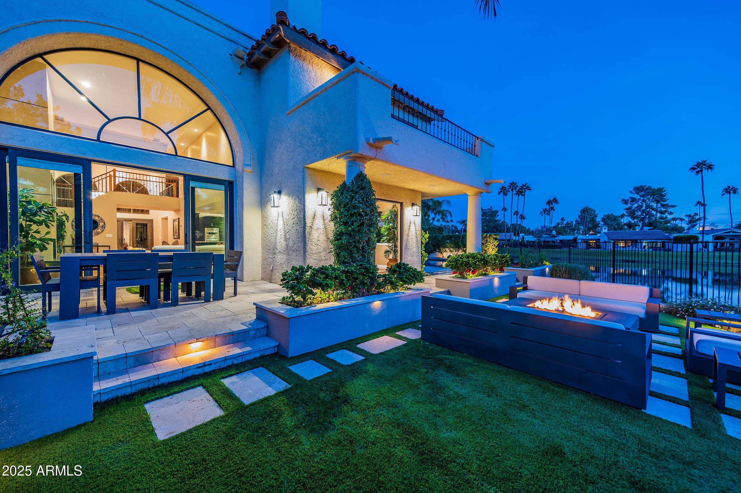 3103 East Georgia Avenue Phoenix, AZ 85016 - Photo 28 of 36 a wooden bench sitting in front of a house