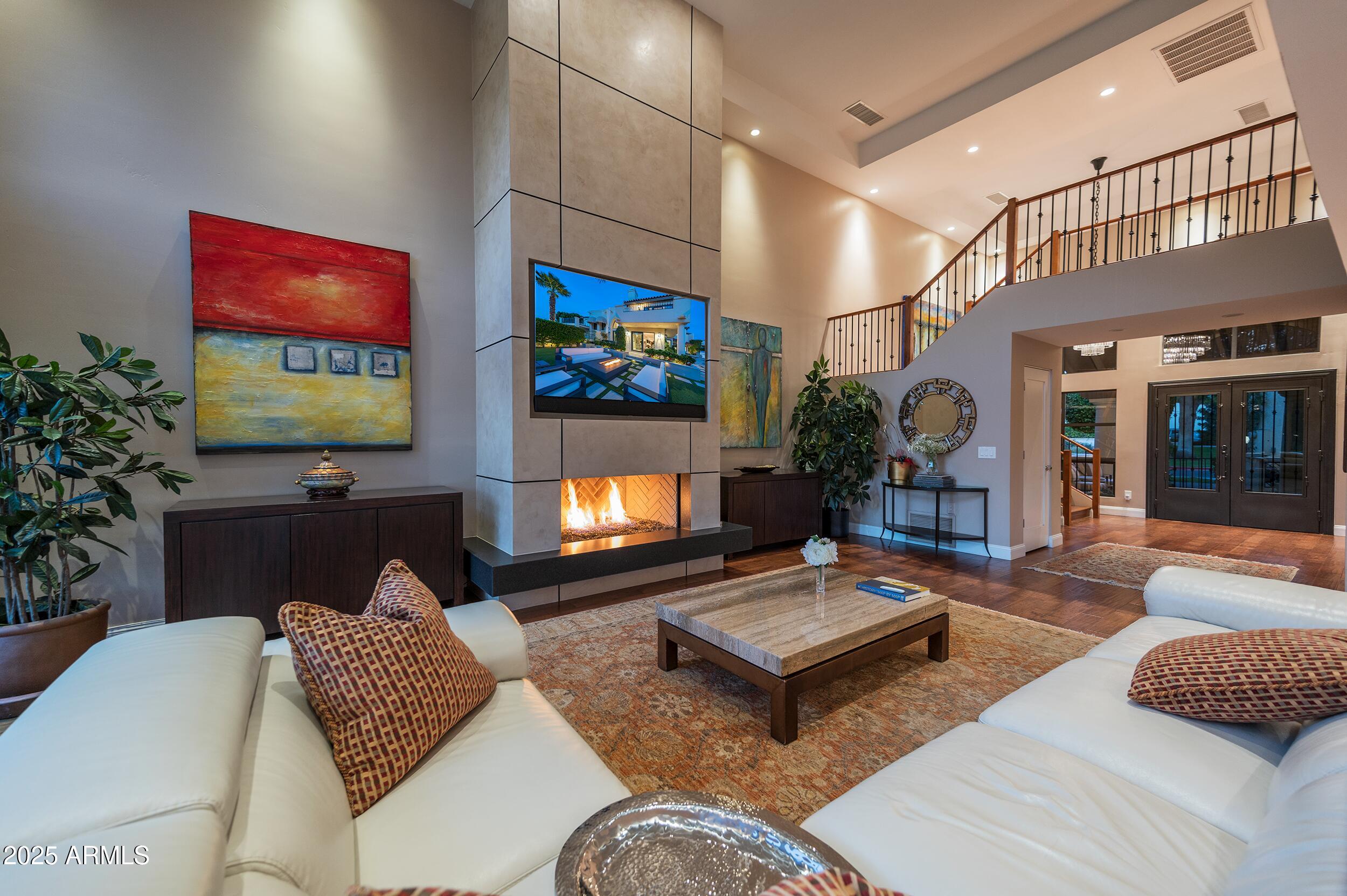 3103 East Georgia Avenue Phoenix, AZ 85016 - Photo 7 of 36 a living room with furniture and a flat screen tv