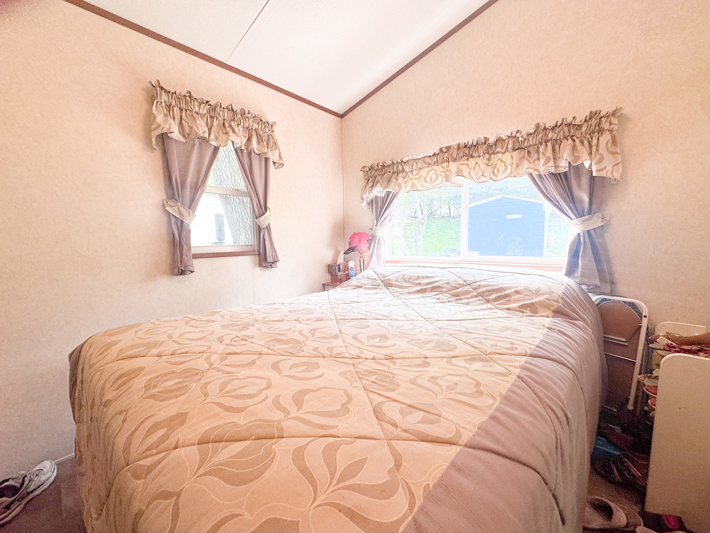 7-98 Woodhaven Sublette, IL 61367 - Photo 13 of 23 a bedroom with a bed and a window