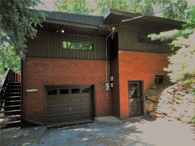 Its the story. This home reminds me of where the Bradys lived.  Welcome to your year-round hideaway. Take the stair on the left to enter at the main-level living room.