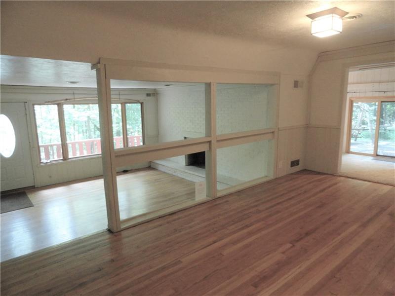 112 Saunders Road Trafford, PA 15085 - Photo 13 of 23 The space in the foreground would most likely be used for your formal dining room. To the left the sunken living room (and front door). To the right, the massive family room.
