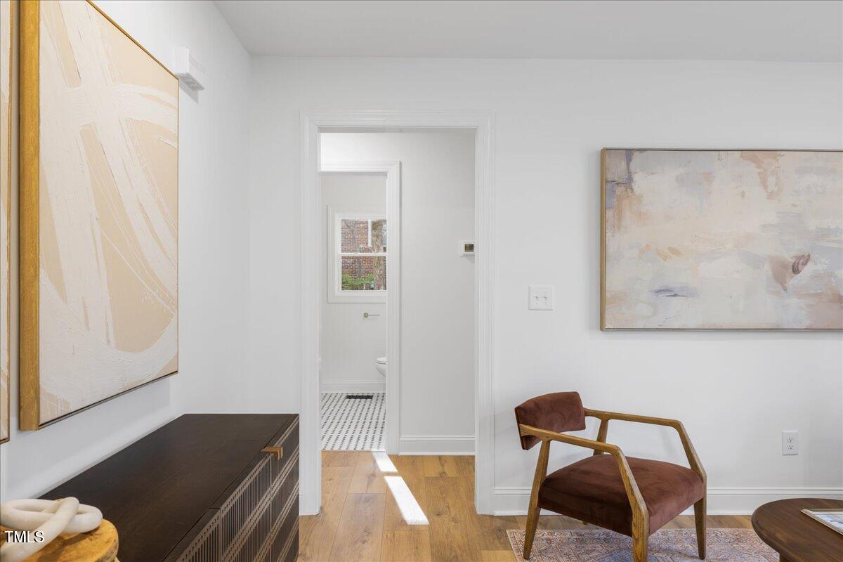 2703 Augusta Drive Durham, NC 27707 - Photo 19 of 45 a view of a workspace with furniture and a couch