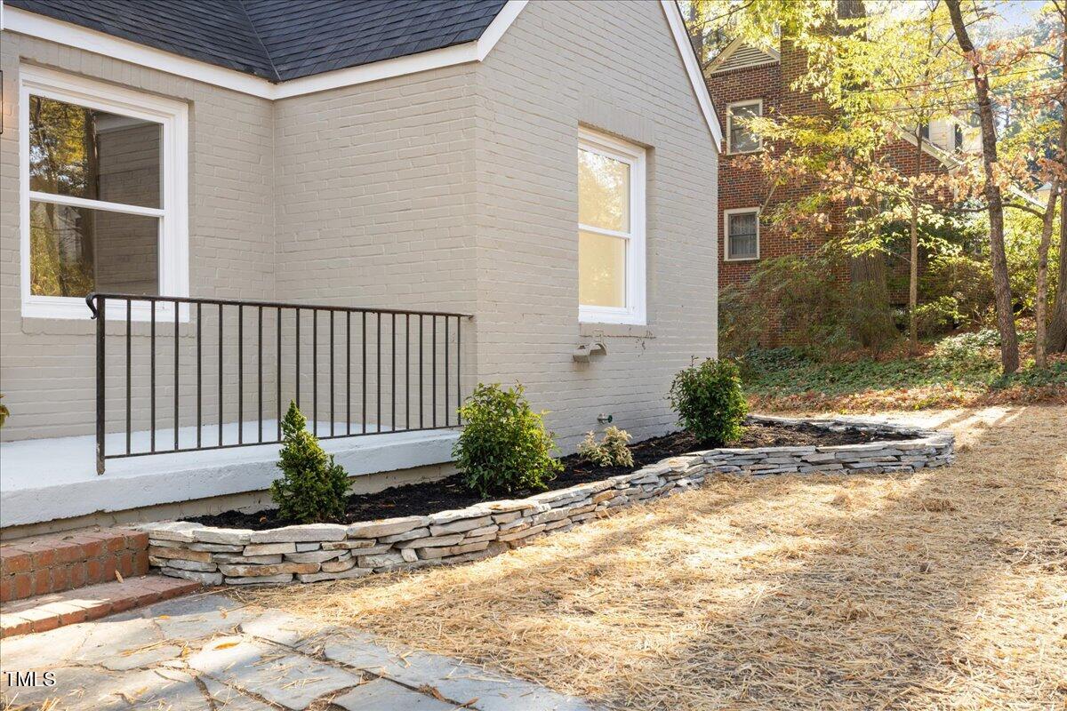 2703 Augusta Drive Durham, NC 27707 - Photo 2 of 45 a white house that has a tree in front of it