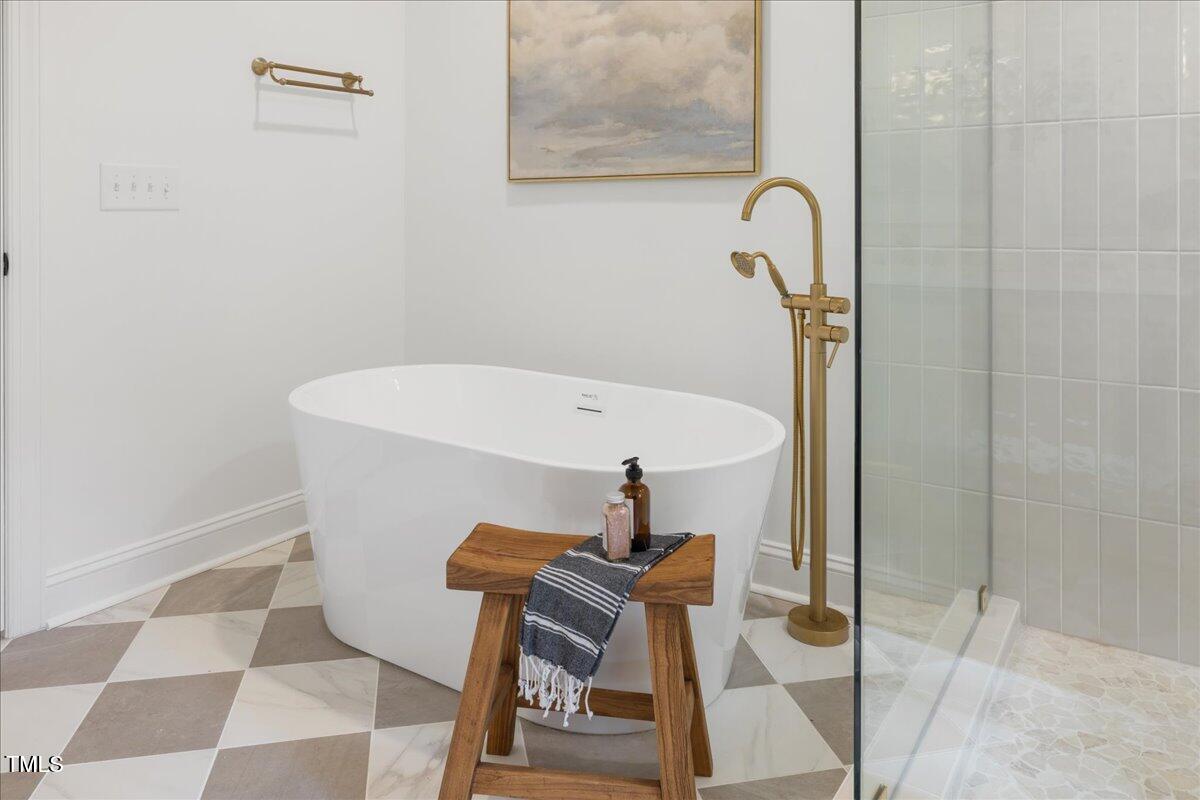 2703 Augusta Drive Durham, NC 27707 - Photo 38 of 45 a bathroom with a sink toilet and shower