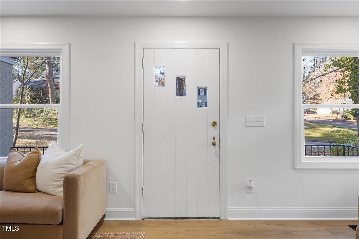 2703 Augusta Drive Durham, NC 27707 - Photo 4 of 45 a living room with furniture and a window
